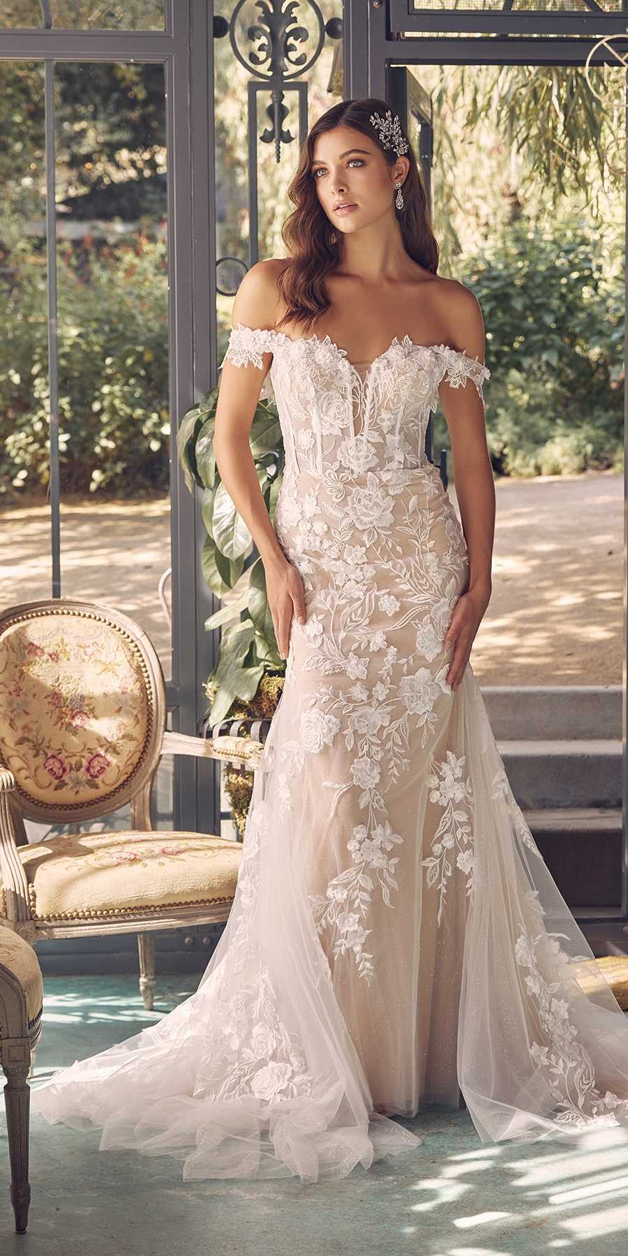 Off-shoulder embroidered wedding gown, fitted bodice with long flowing tulle skirt, white & nude