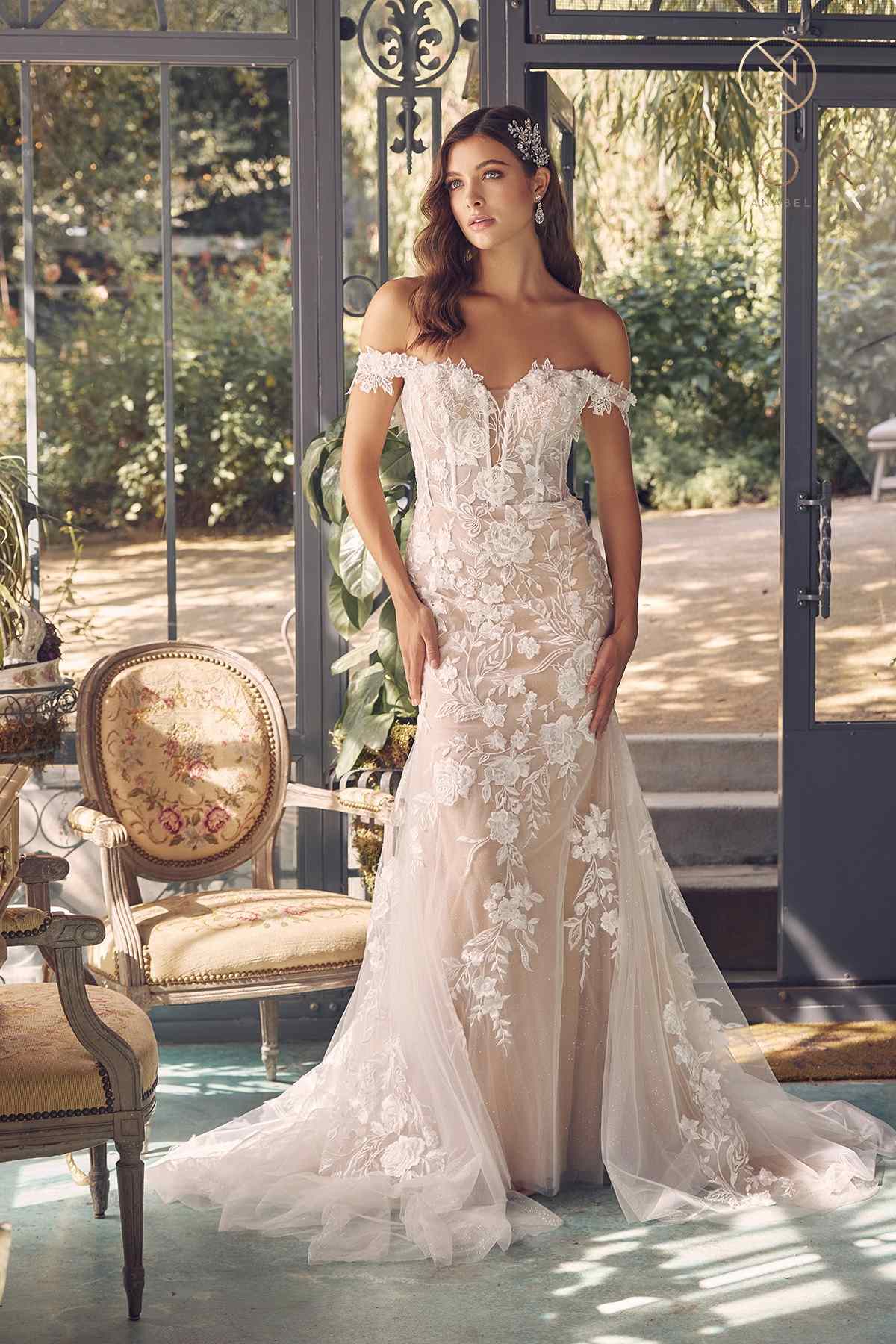 Off-shoulder embroidered wedding gown with fitted bodice and long tulle skirt, front view