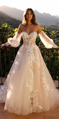 White strapless corset A-line bridal gown with long puff sleeves and floral appliqué