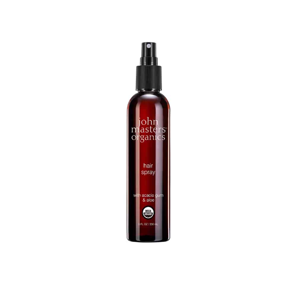 JOHN MASTERS ORGANICS hair spray bottle with black pump, amber glass