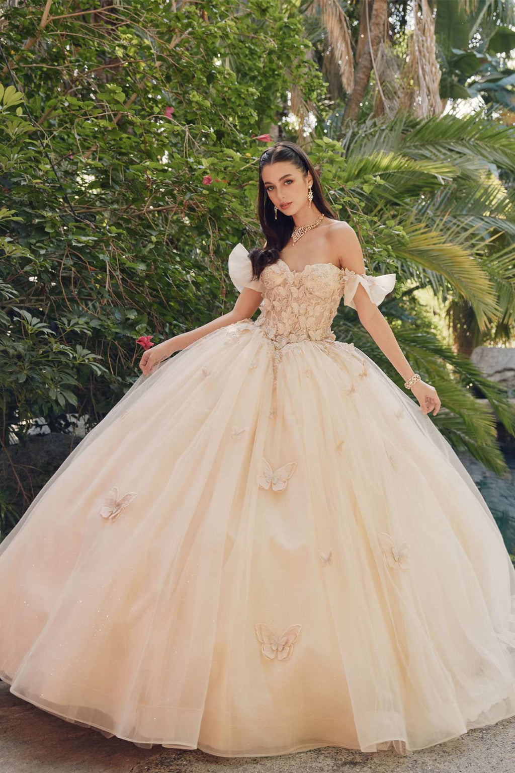 Champagne off-shoulder A-line ball gown with embroidered bodice and voluminous tulle skirt