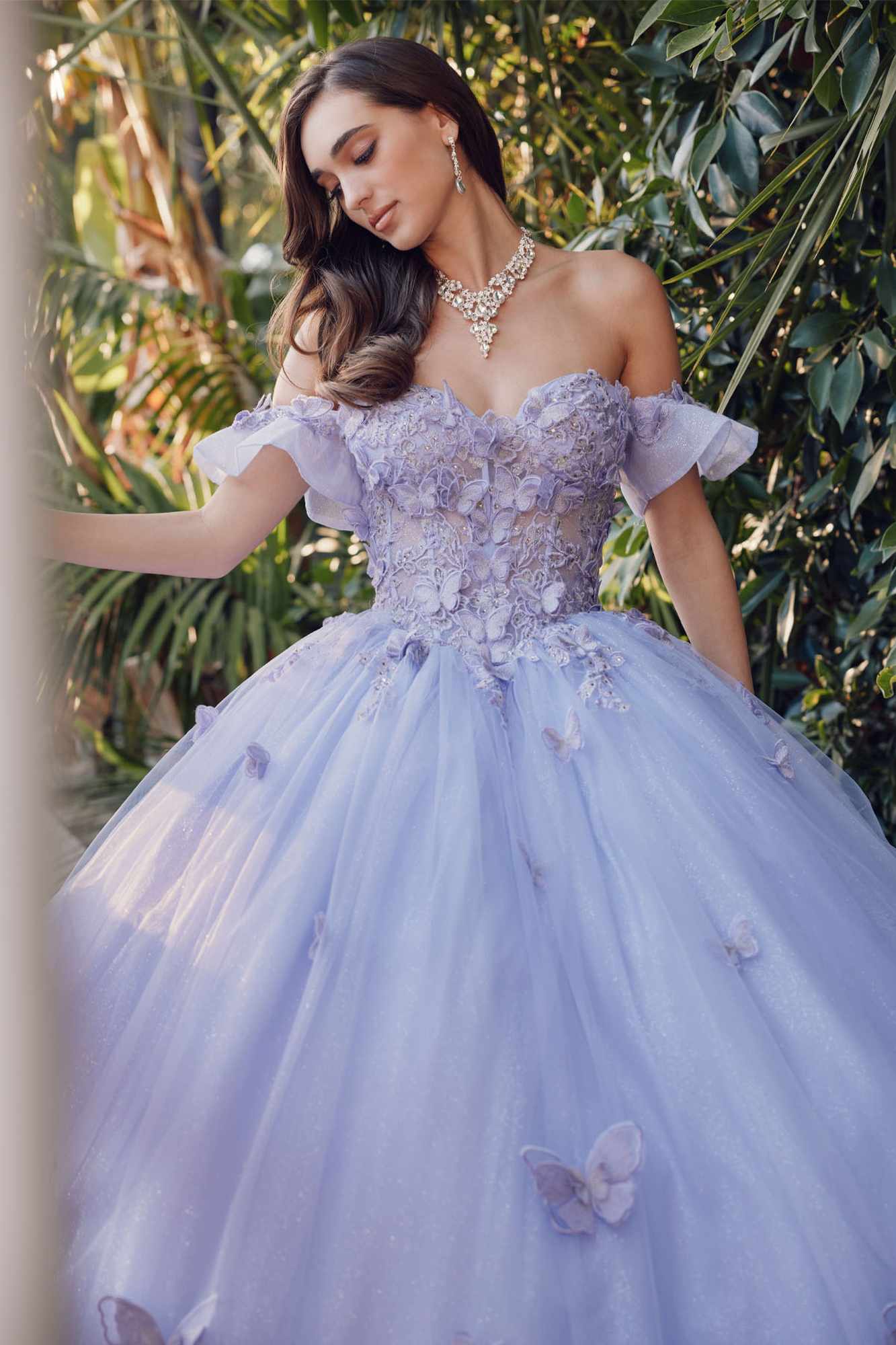Lilac off-shoulder ball gown with ruffled lace bodice and full tulle skirt