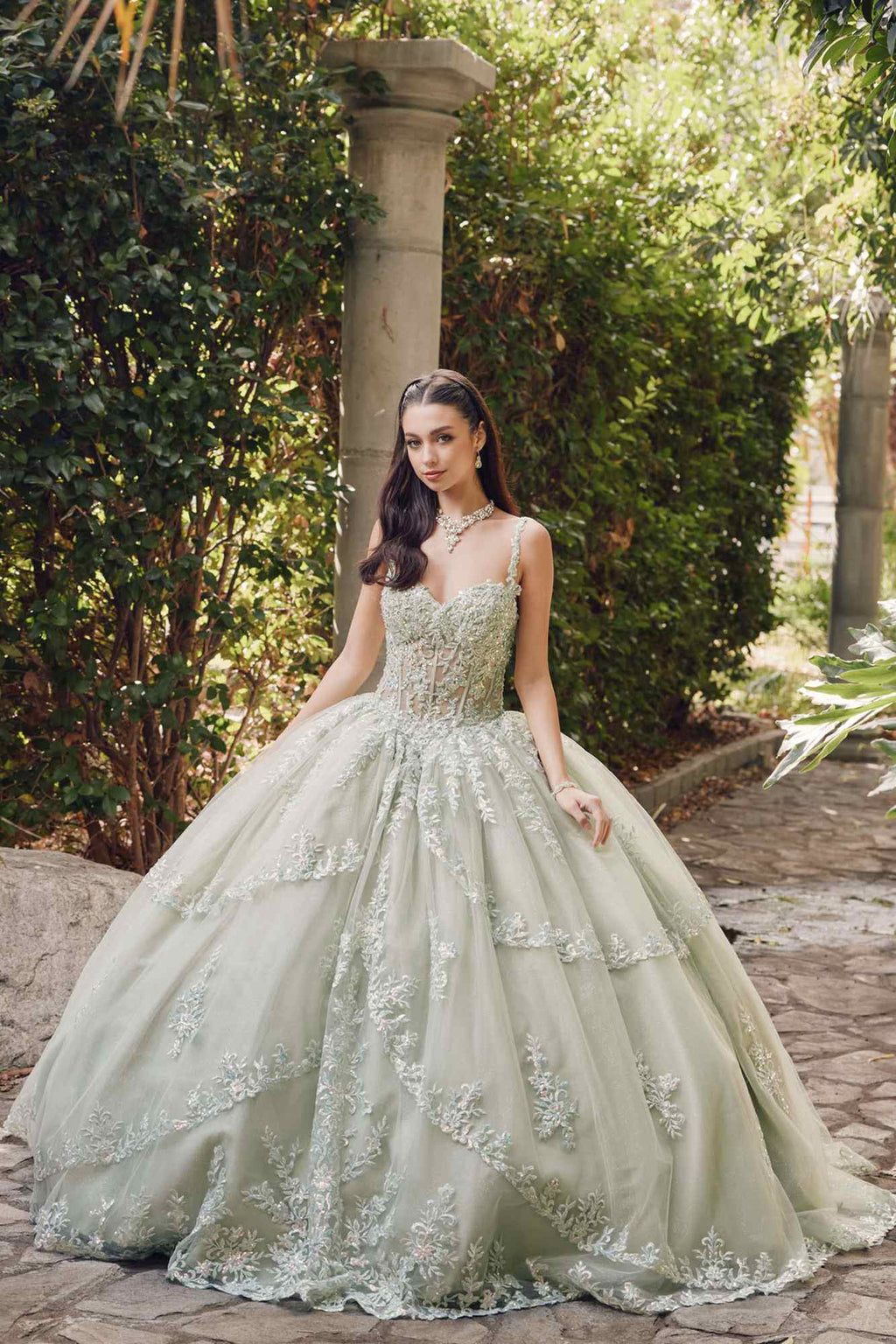 Sweetheart corset ball gown with embroidered lace bodice and wide flared skirt