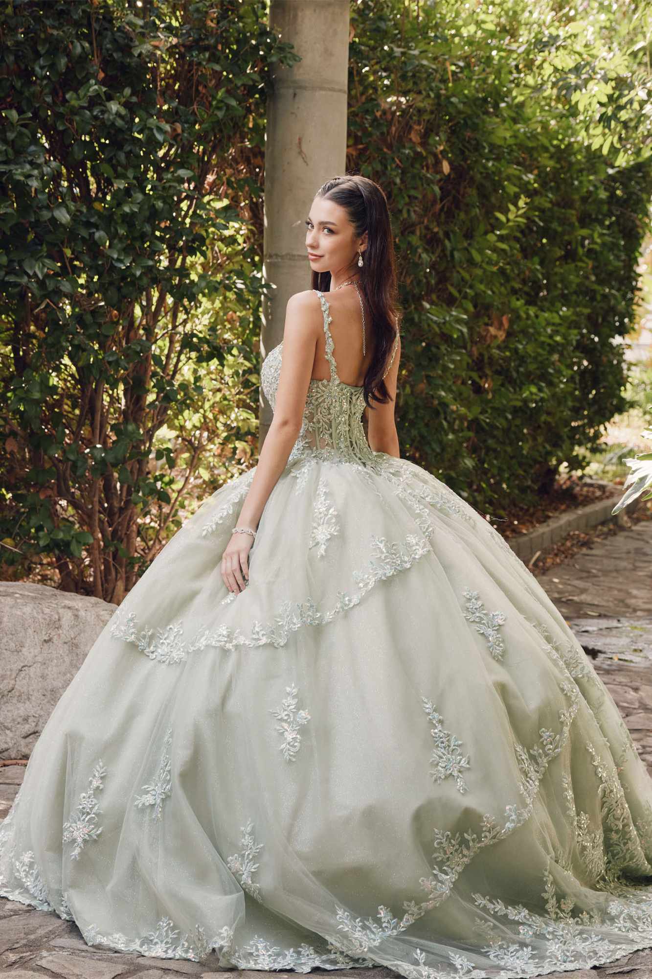 Sweetheart corset ball gown with lace detailing and full skirt, side view