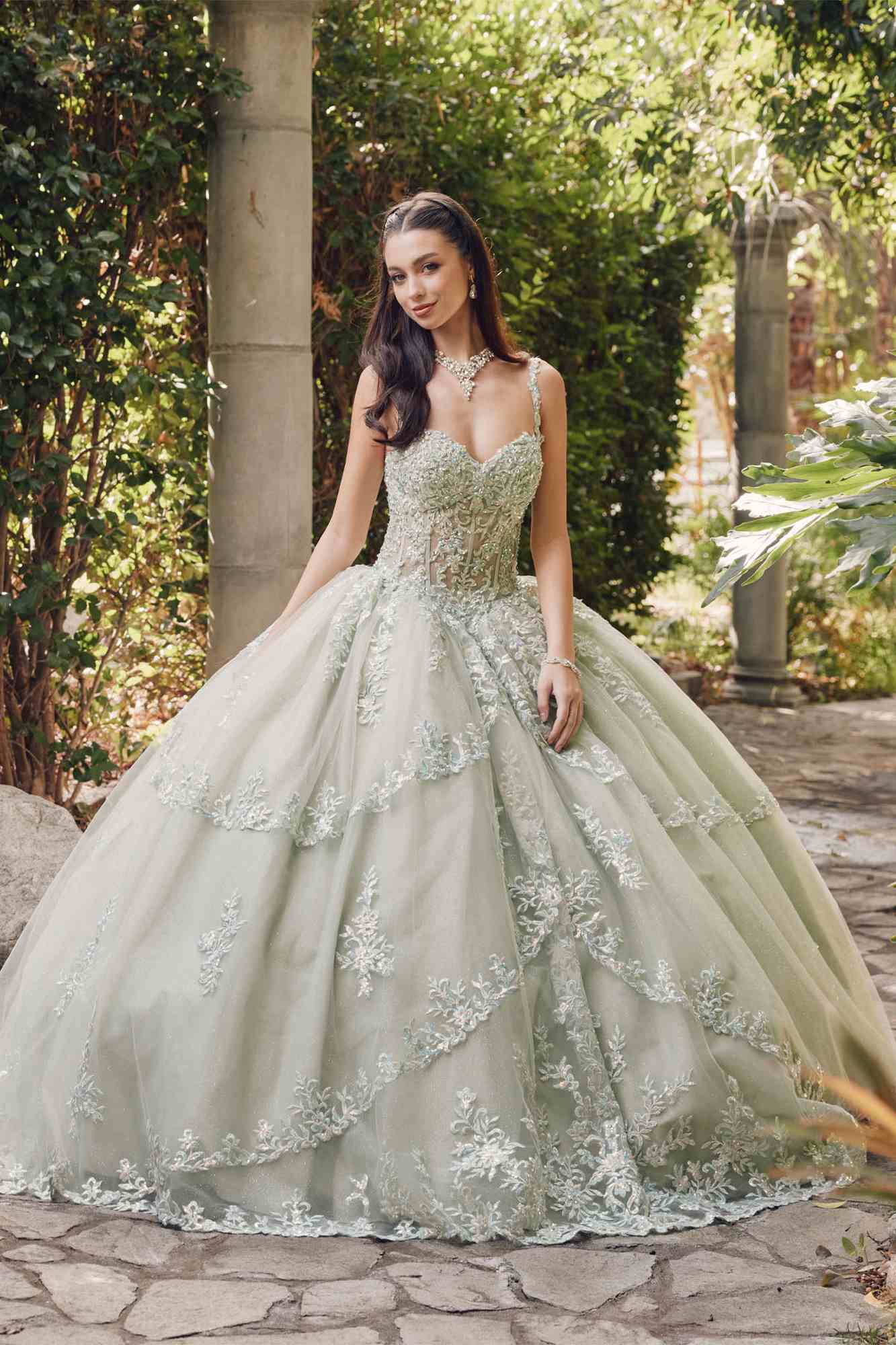 Sweetheart corset ball gown with lace applique, spaghetti straps, and full gathered skirt