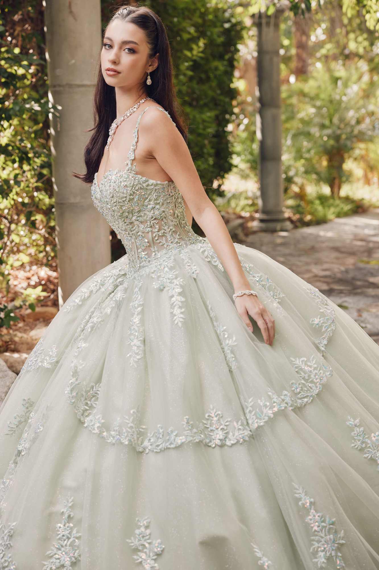 Sweetheart corset ball gown with lace applique straps and gathered tulle skirt