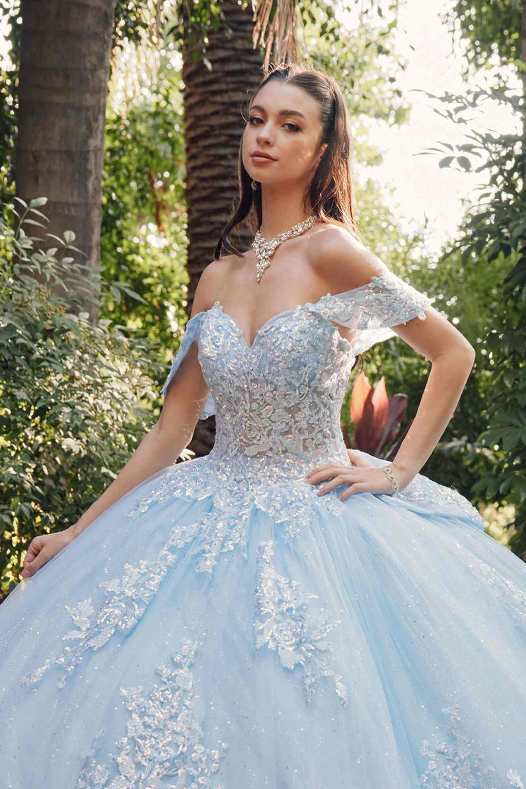 Light blue off-shoulder quince gown with lace bodice and full tulle skirt, long train