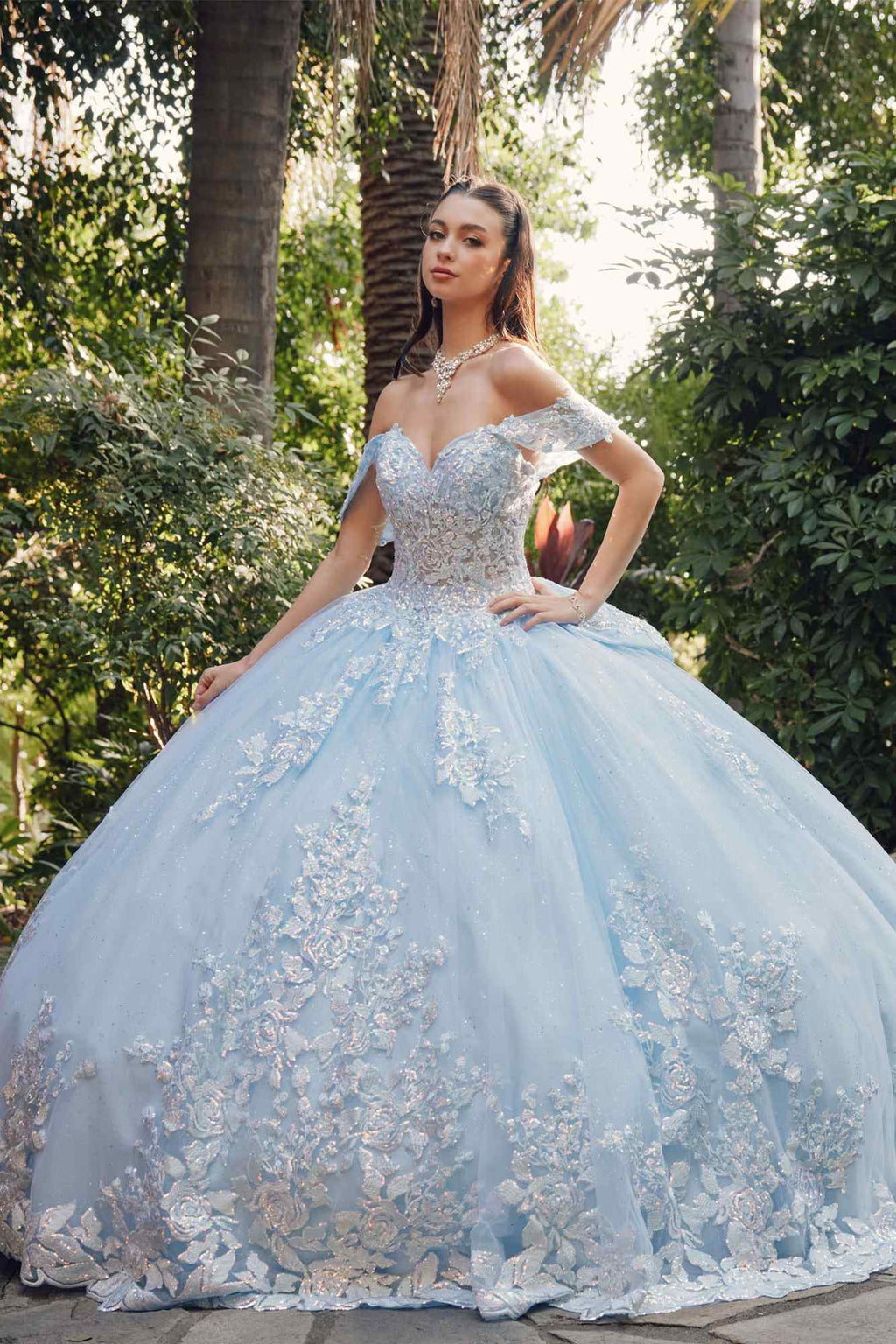 Light blue off-shoulder quince gown with lace appliqué bodice and full cathedral train