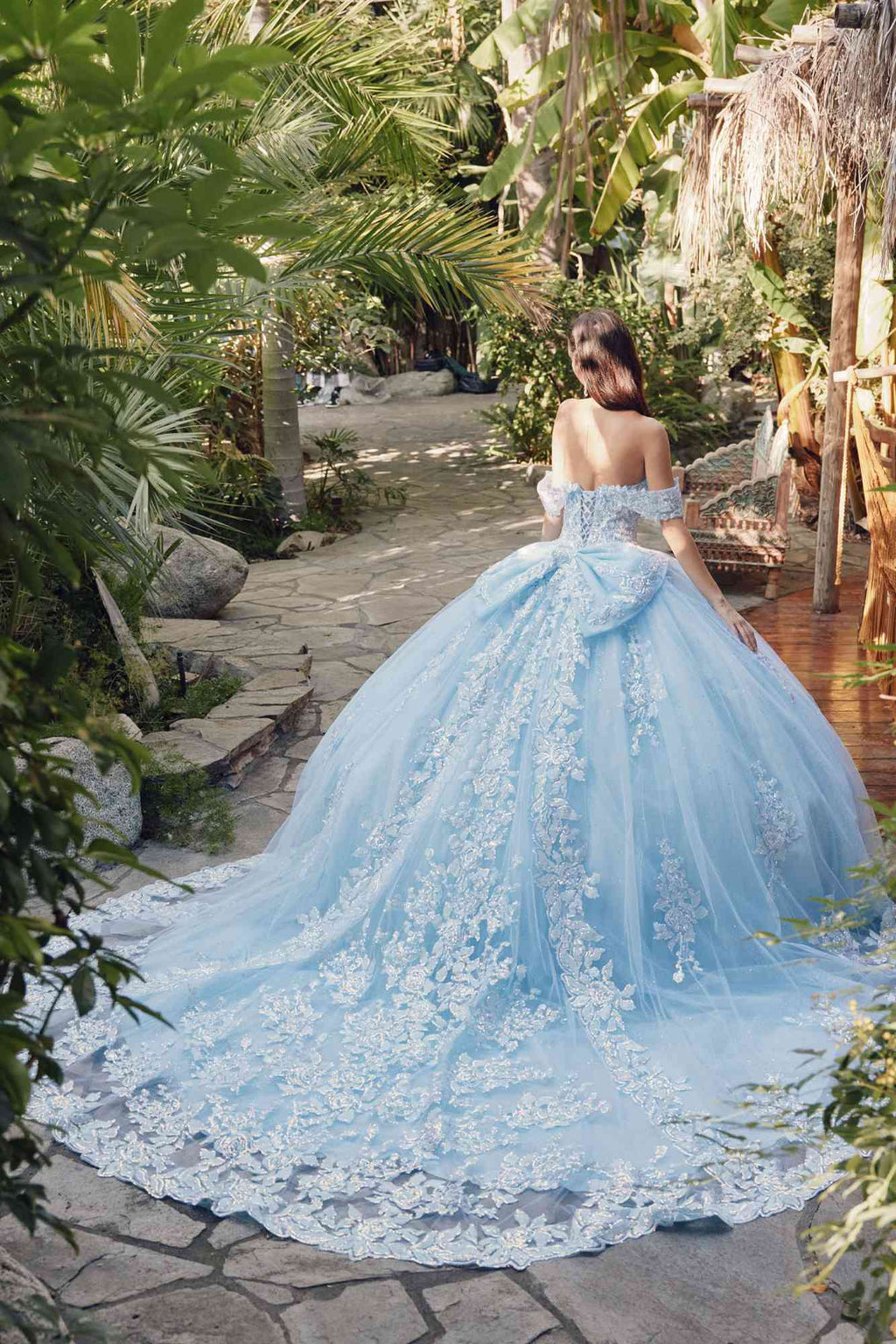 Light blue quince ball gown from back, off-shoulder lace bodice and long train
