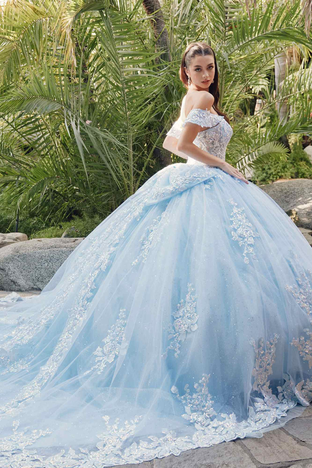 Light blue off-shoulder quince gown with lace detailing and full tulle skirt, cathedral train