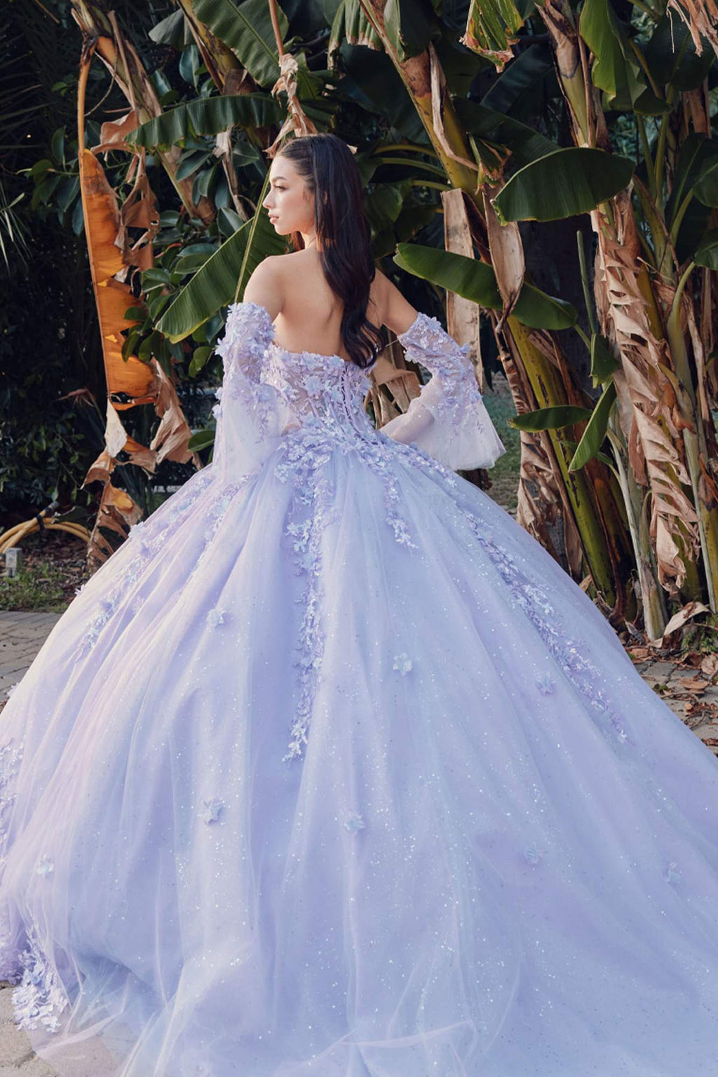 Lilac strapless princess ball gown with lace appliqué bodice and wide flared skirt