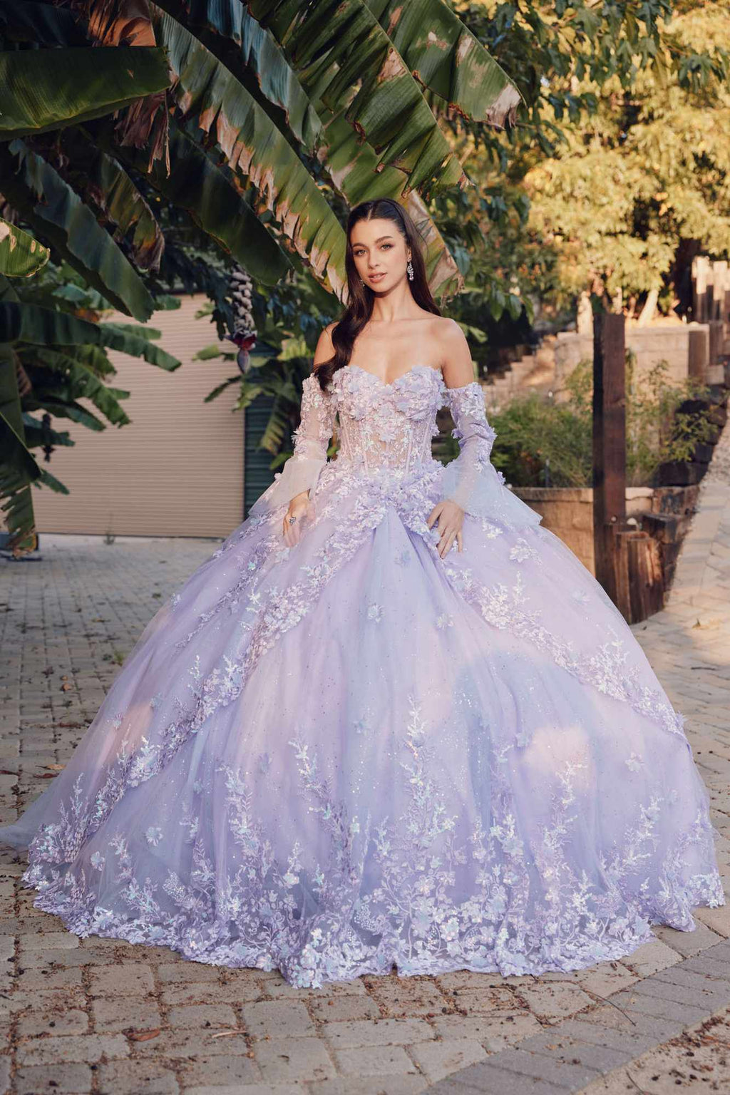Lilac strapless princess ball gown with off-shoulder puff sleeves and lace appliqué skirt