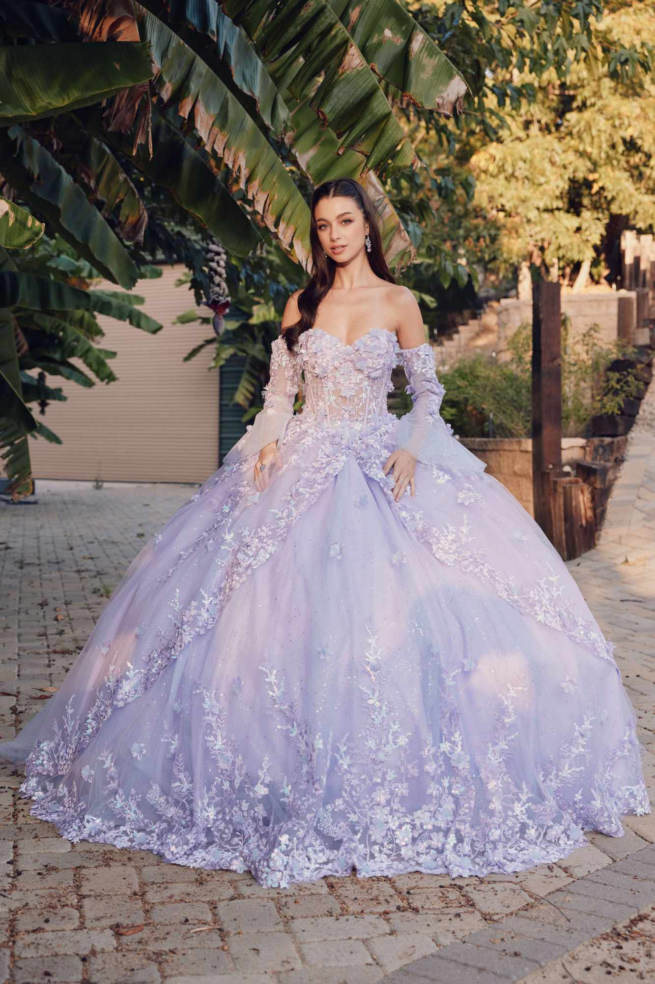 Lilac strapless princess ball gown with off-shoulder puff sleeves and lace appliqué skirt