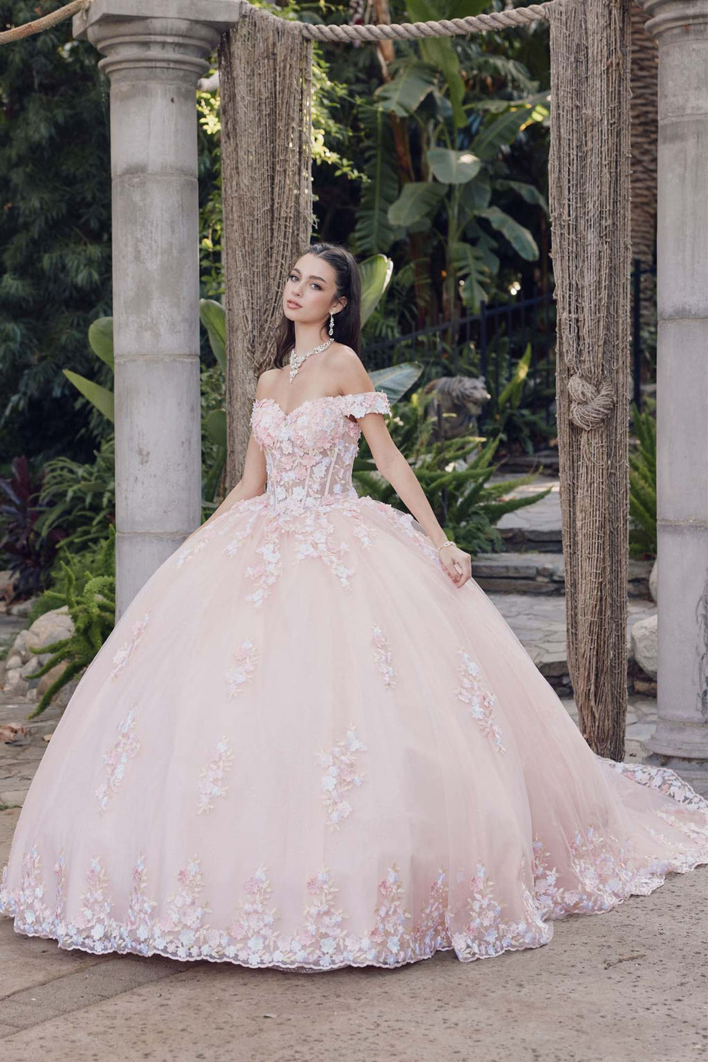 Blush off-shoulder corset bodice gown with lace floral appliques and full tulle skirt