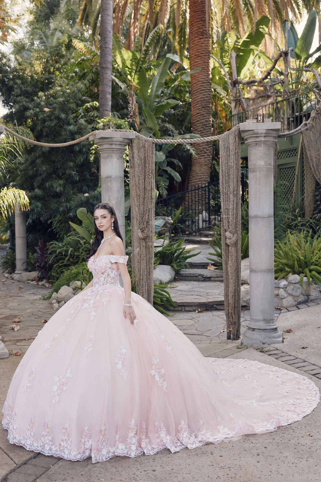 Blush off-shoulder corset bodice gown with lace floral details and sweeping full skirt