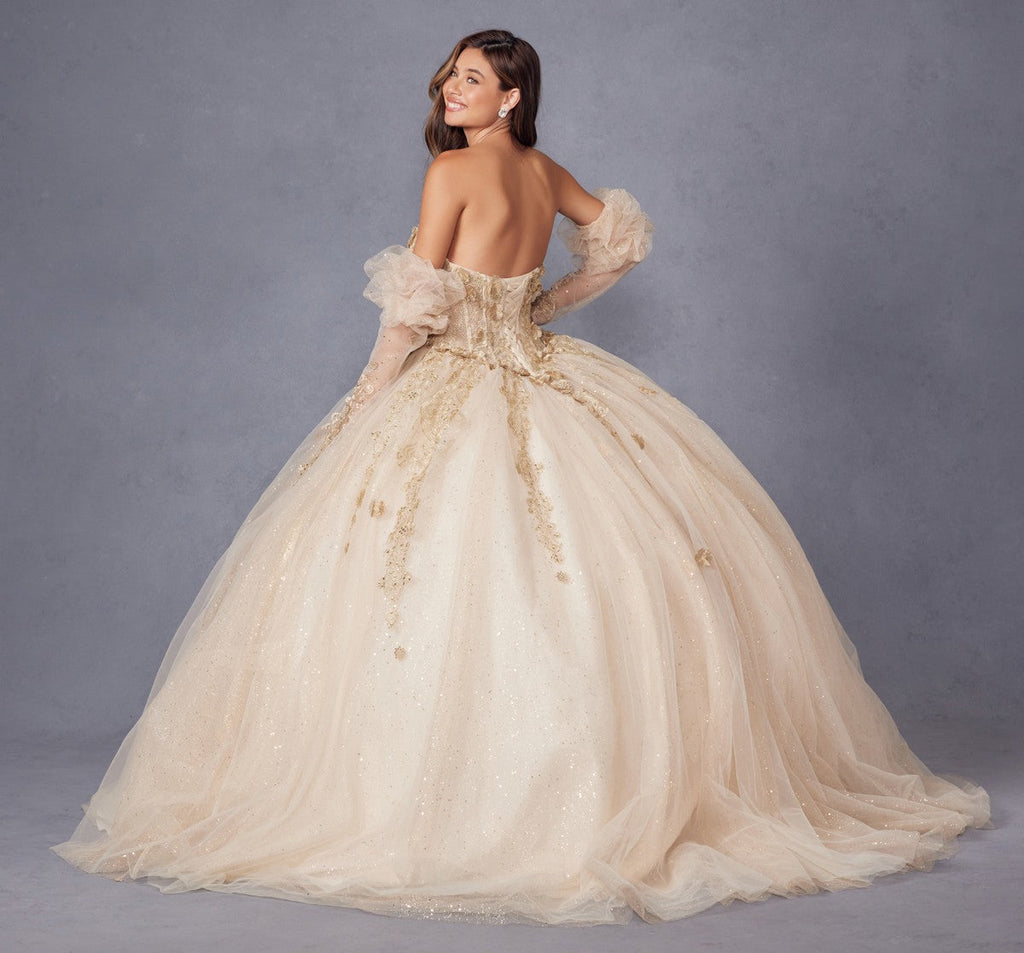 Champagne quinceanera dress from back with puff sleeves, 3D flower appliques, and full skirt