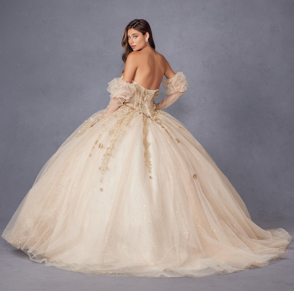 Champagne quinceanera ball gown with back view, puff sleeves, 3D flower applique detailing