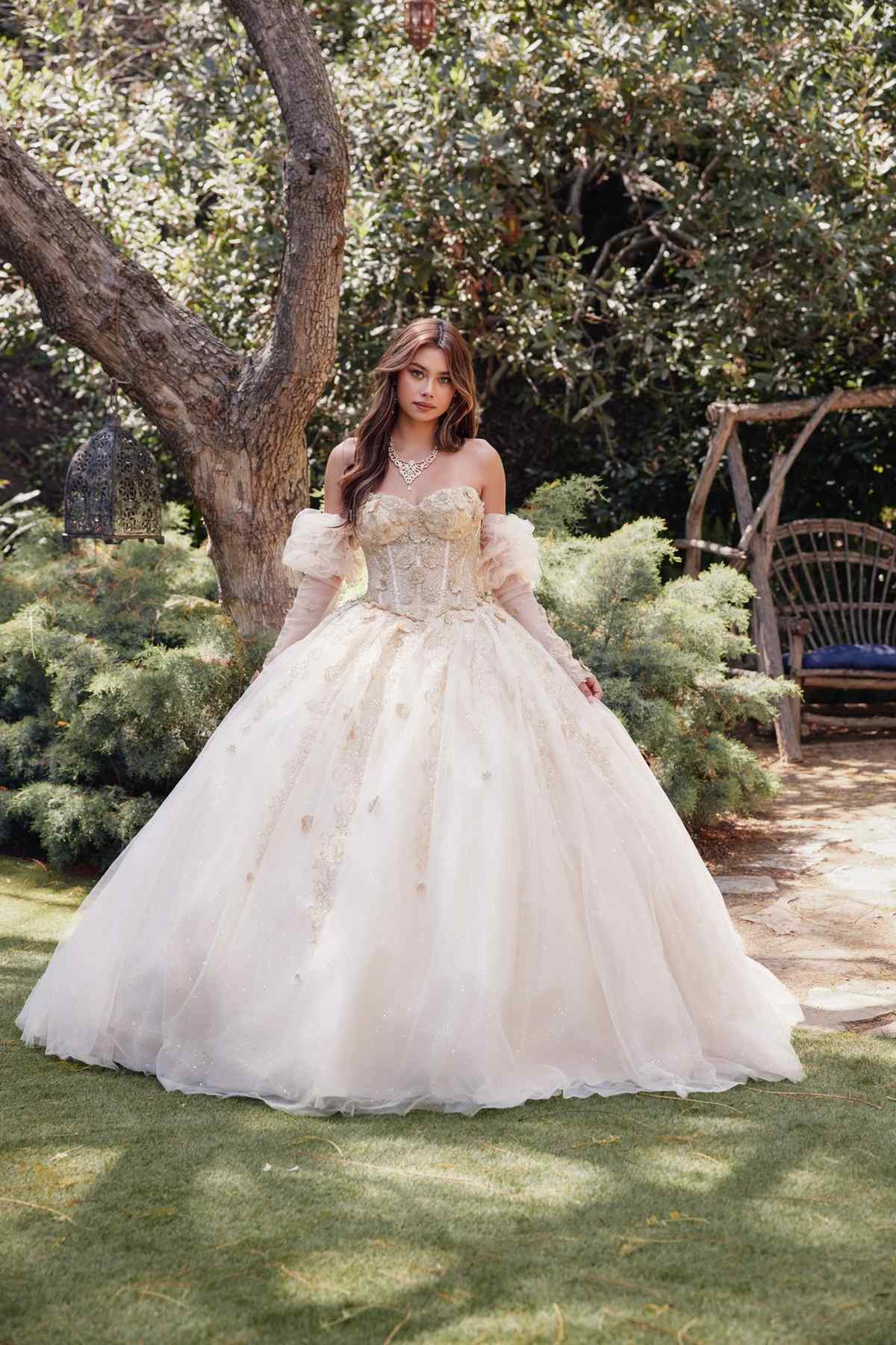 Champagne ball gown quinceanera dress with 3D flower appliques, puff sleeves, and layered skirt