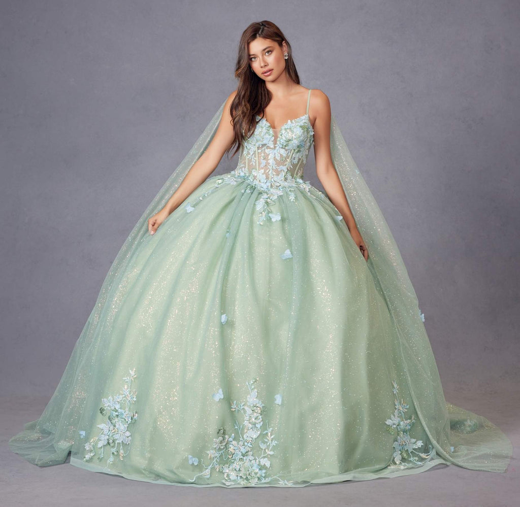 Sage green formal gown with floral lace appliques, corset-style bodice, and long cape sleeves