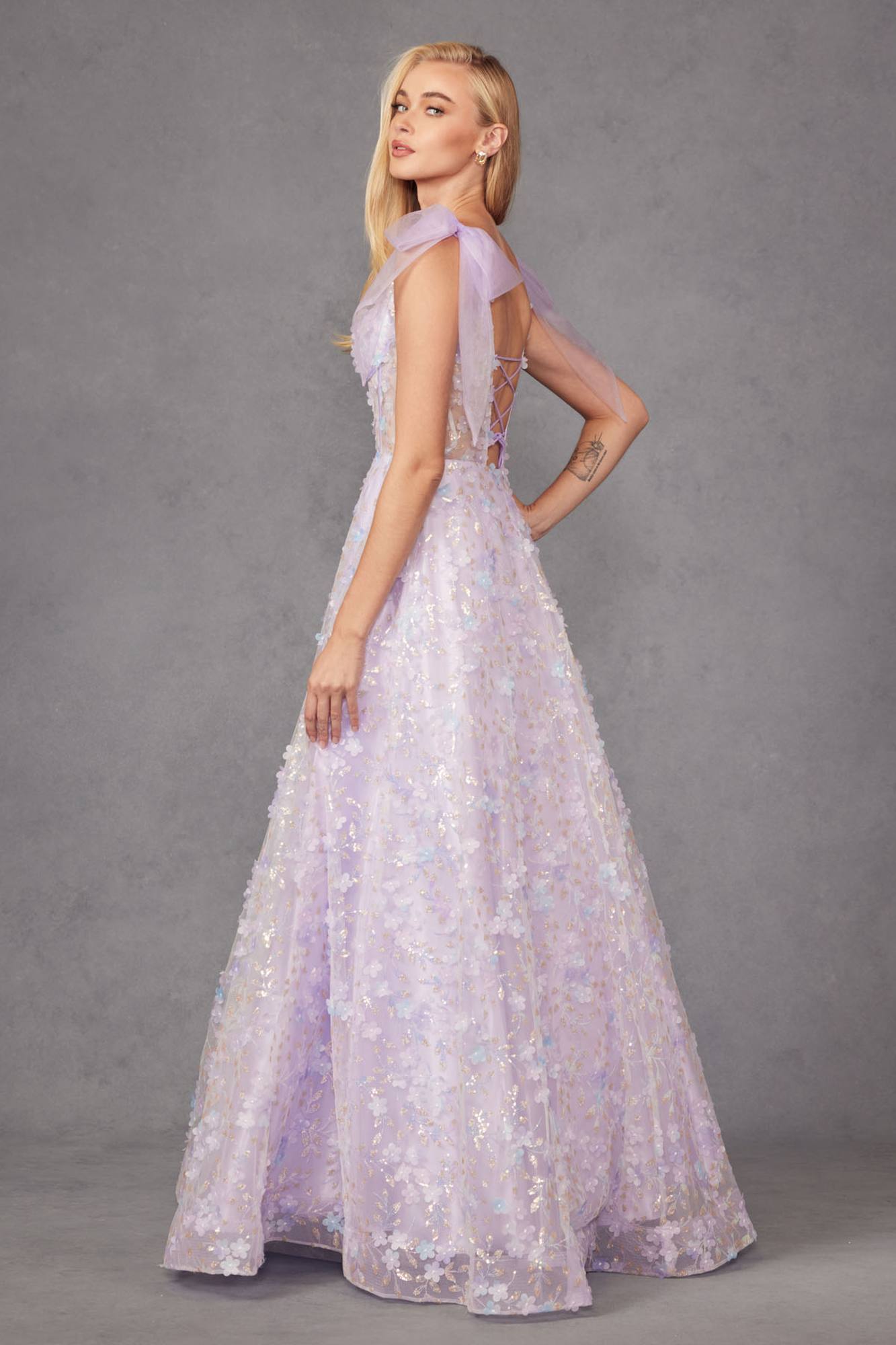 Lilac A-line long gown with V-neck, sheer cap sleeves, 3D floral glitter texture, lace bodice.