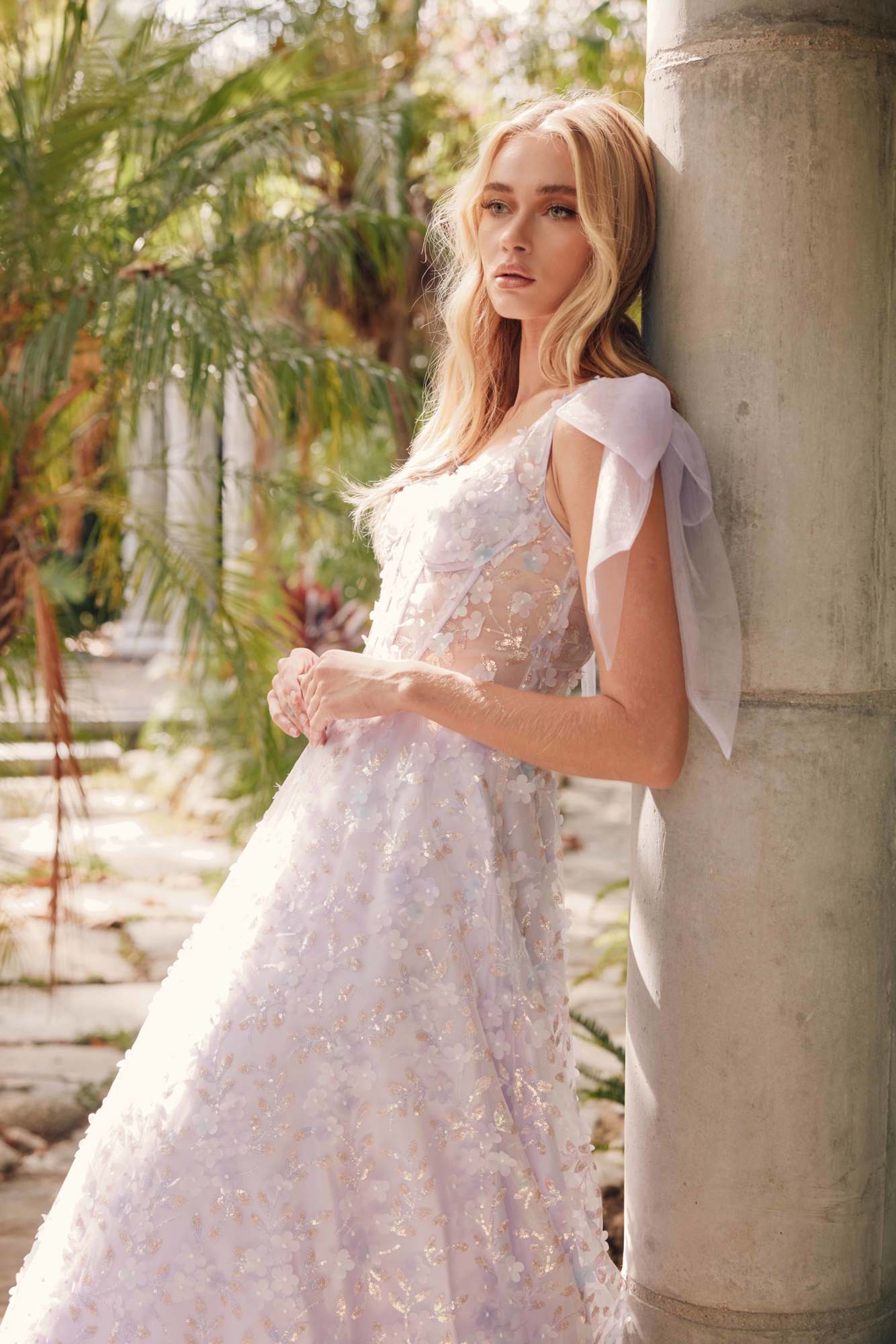 Lilac A-line gown, embroidered bodice with sheer cap sleeve, 3D floral glitter fabric.