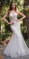 Off-white mermaid wedding dress with embellished corset bodice and sheer tulle skirt