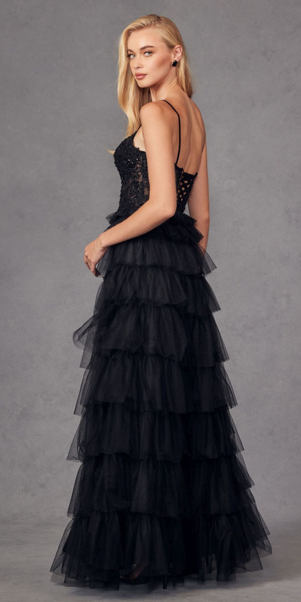Black sleeveless lace bodice gown with layered tiered ruffle skirt, A-line silhouette