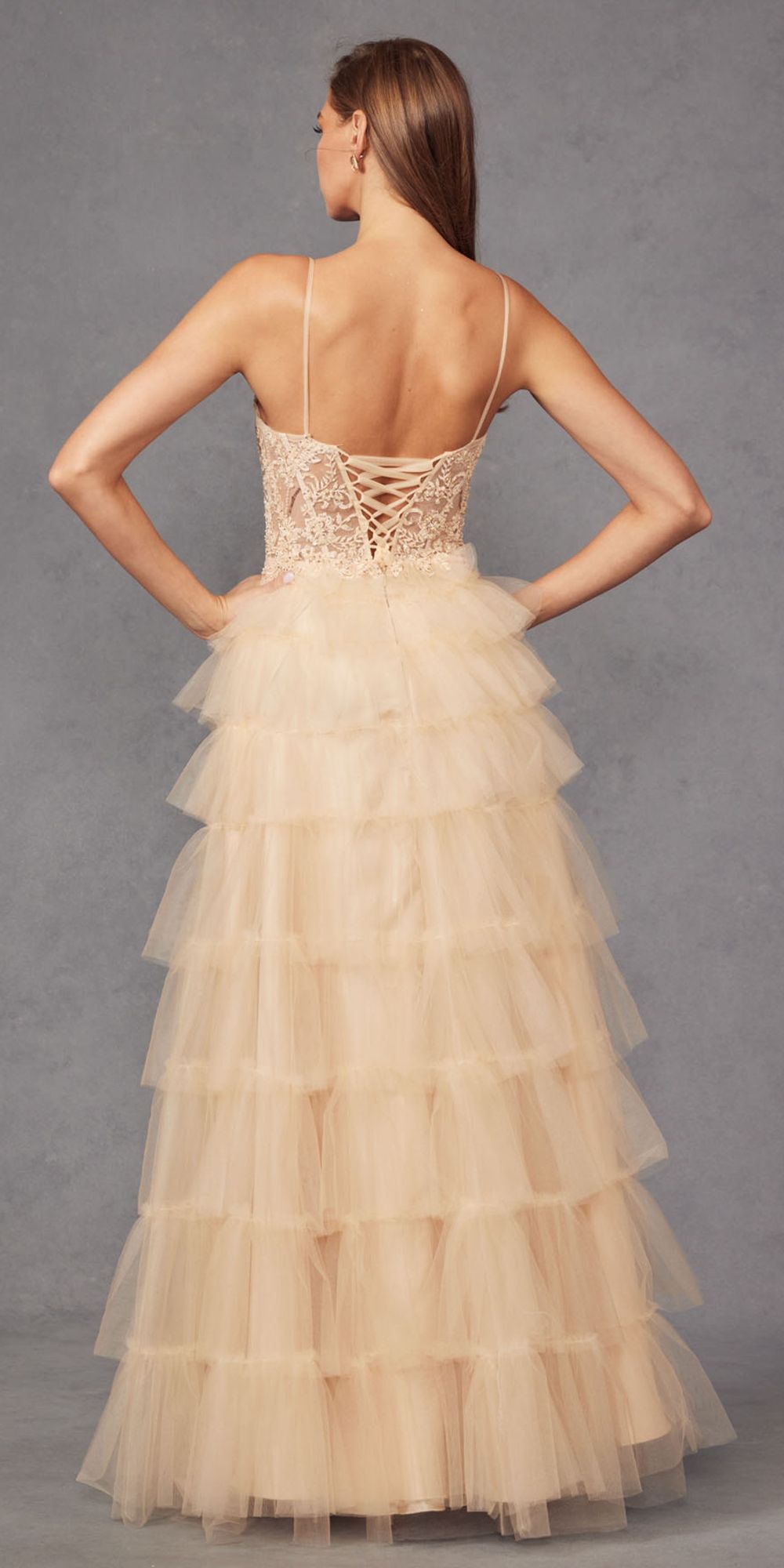 Ivory sleeveless lace bodice tiered tulle A-line ruffled gown, open back