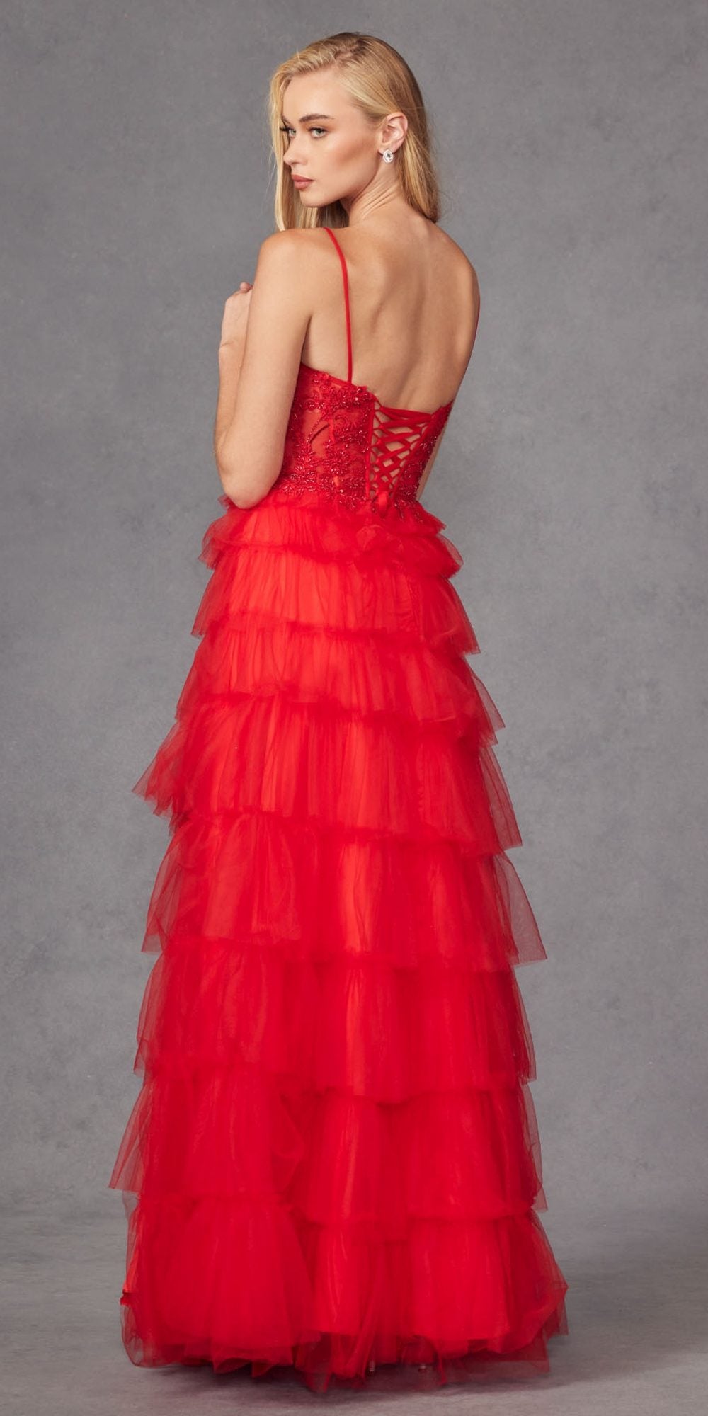 Red sleeveless lace bodice gown with layered tiered ruffle skirt