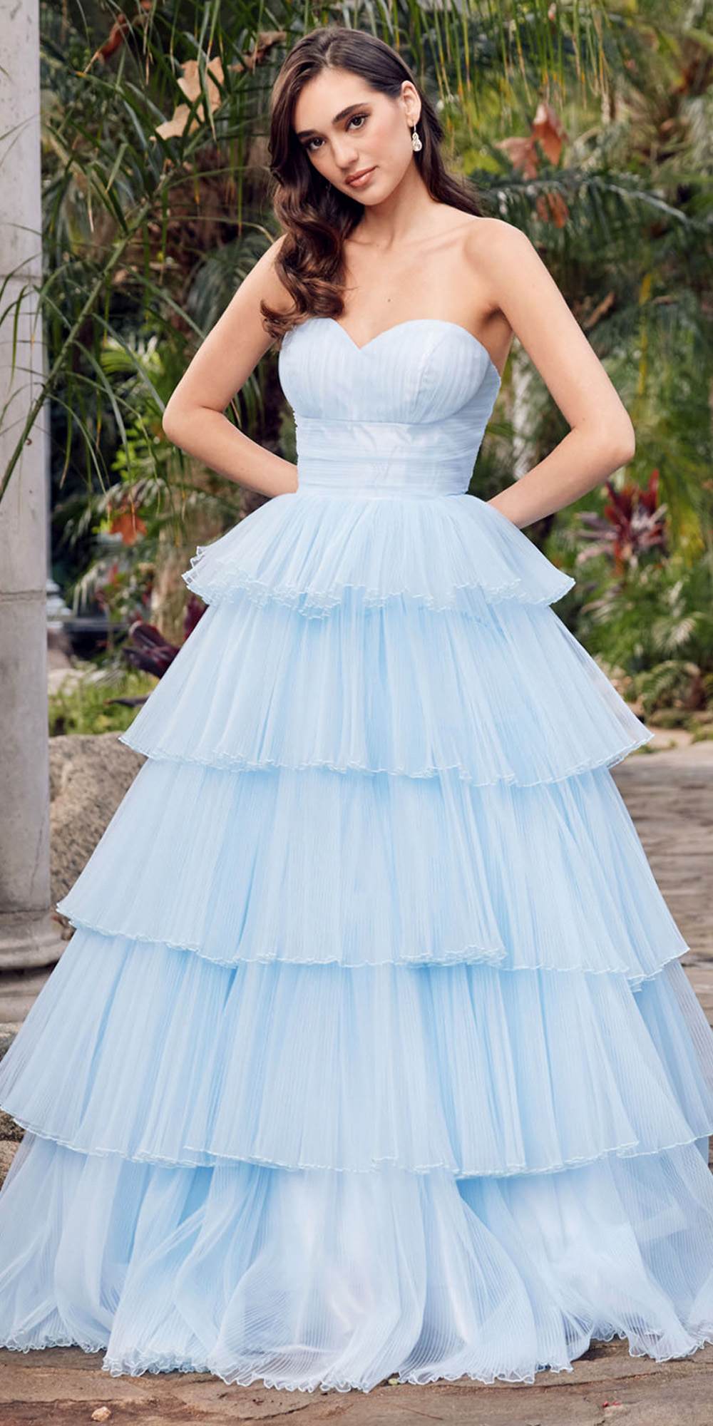 Ice blue strapless tulle A-line gown with tiered ruffle skirt and fitted bodice