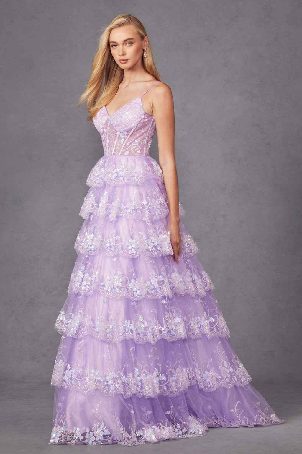 Lilac tiered sequin gown with corset-style bodice and cascading layered ruffle skirt