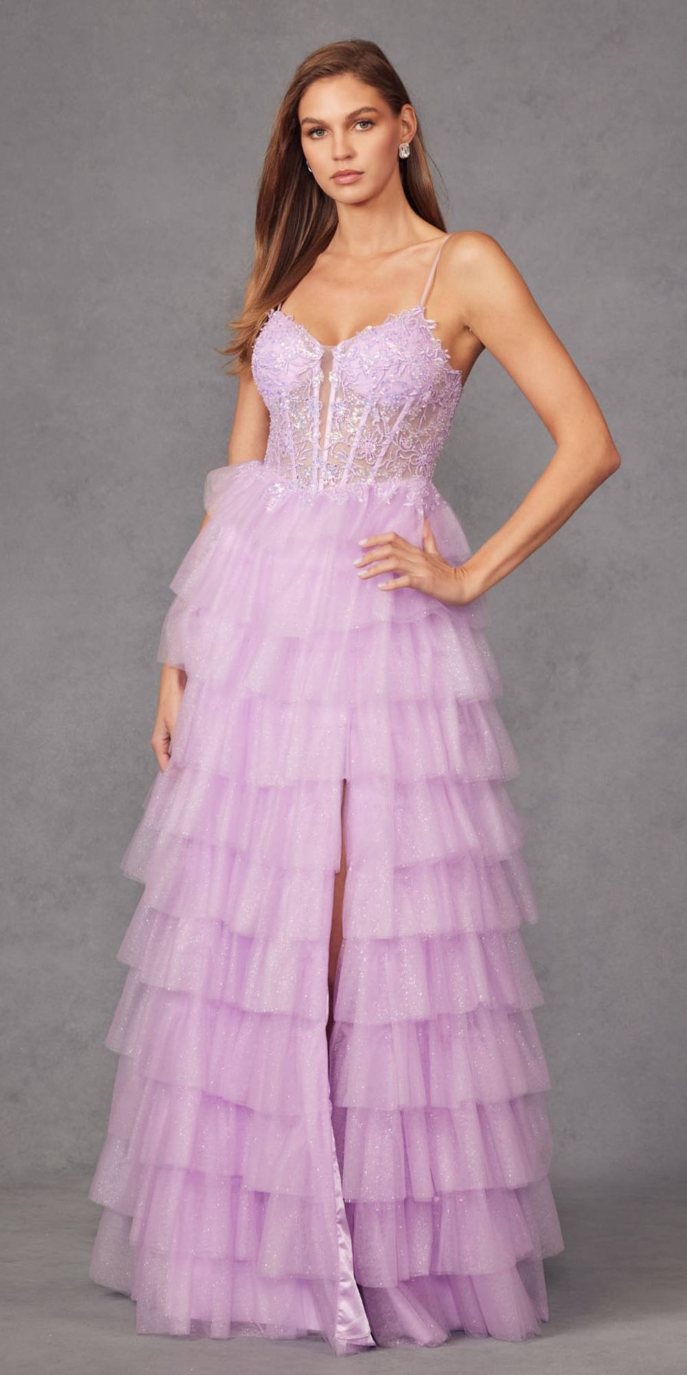 Lilac tulle tiered A-line ball gown with thin straps and jeweled bustier bodice