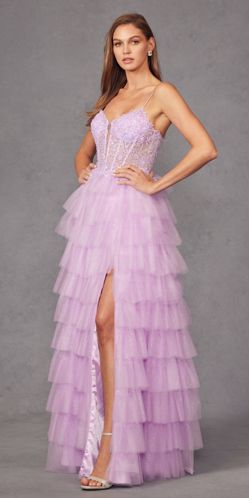 Lilac tulle tiered A-line ball gown with thin straps and jeweled corset bodice