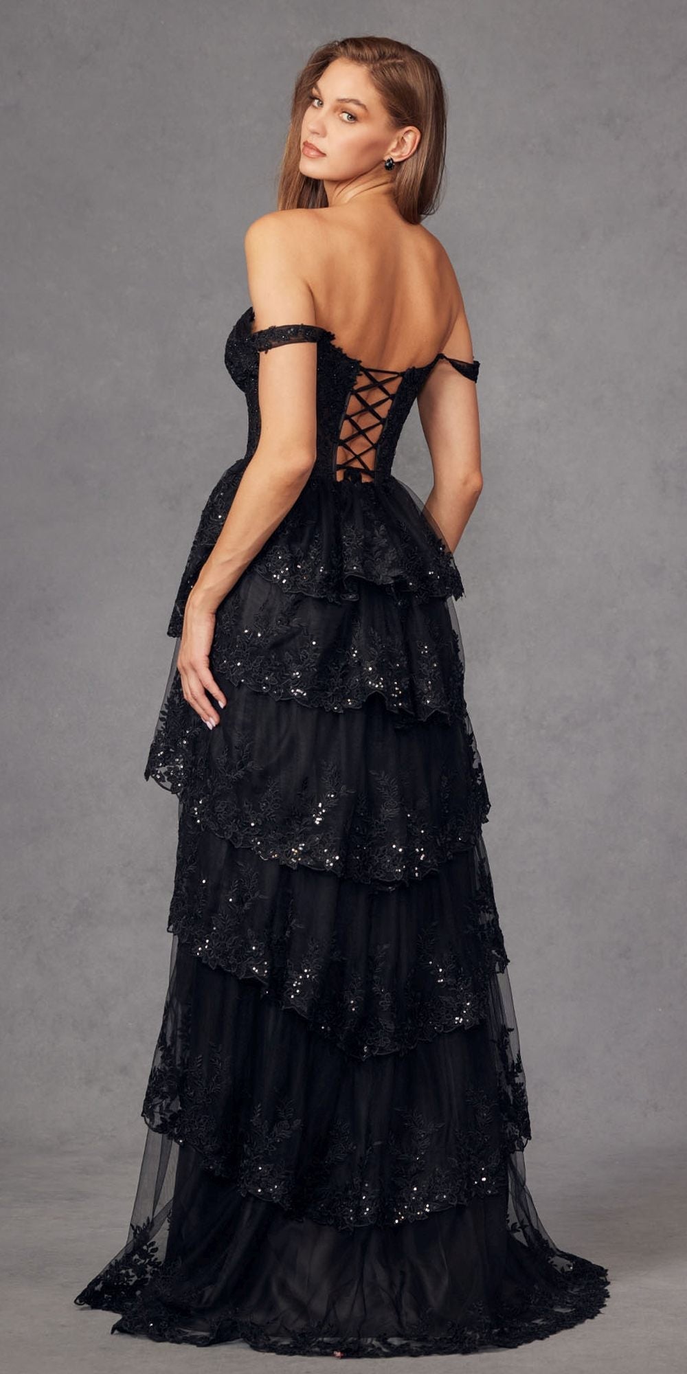 Black tiered ruffle A-line dress with embellished corset bodice and off-shoulder straps