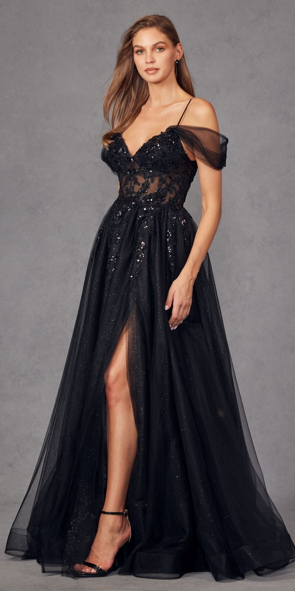 Black cold-shoulder sweetheart corset bodice gown with A-line skirt, sparkle detail, thigh slit.