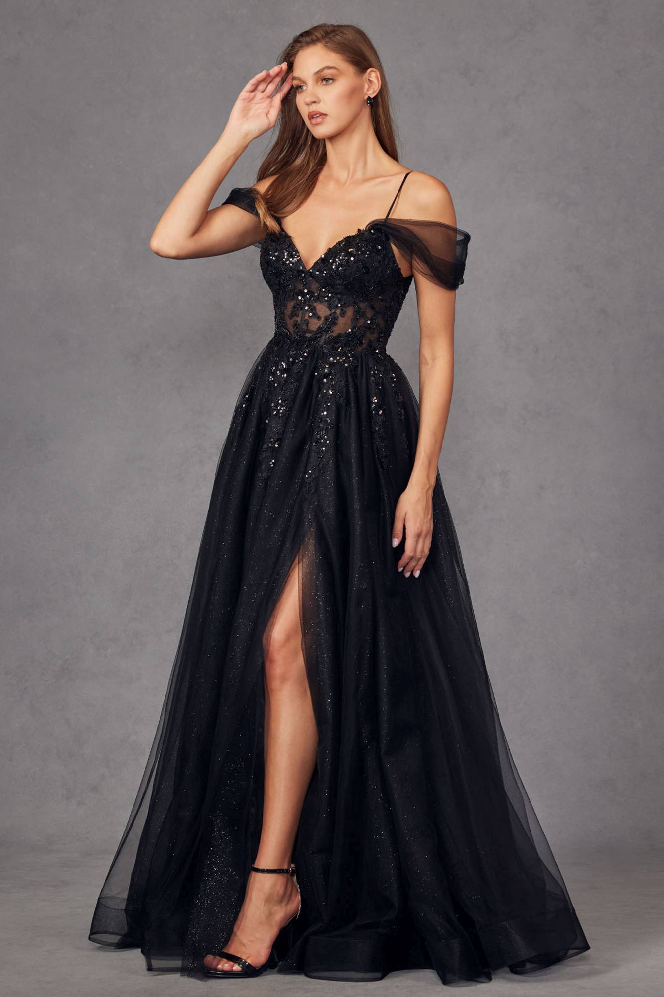 Black sequined off-shoulder corset gown with sweetheart neckline and thigh slit, A-line