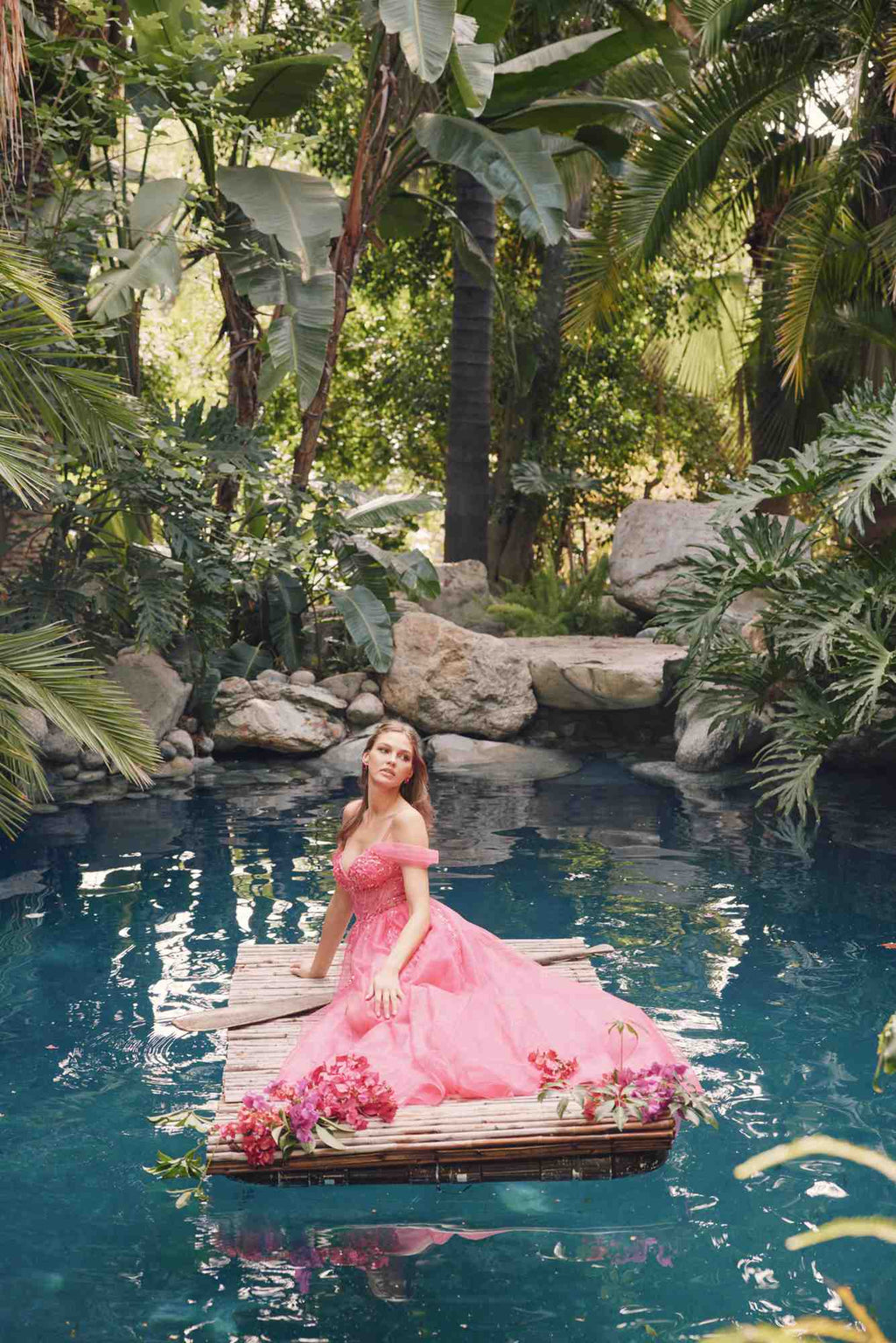 Pink sweetheart corset bodice gown with cold-shoulder straps, full A-line skirt, and thigh slit.