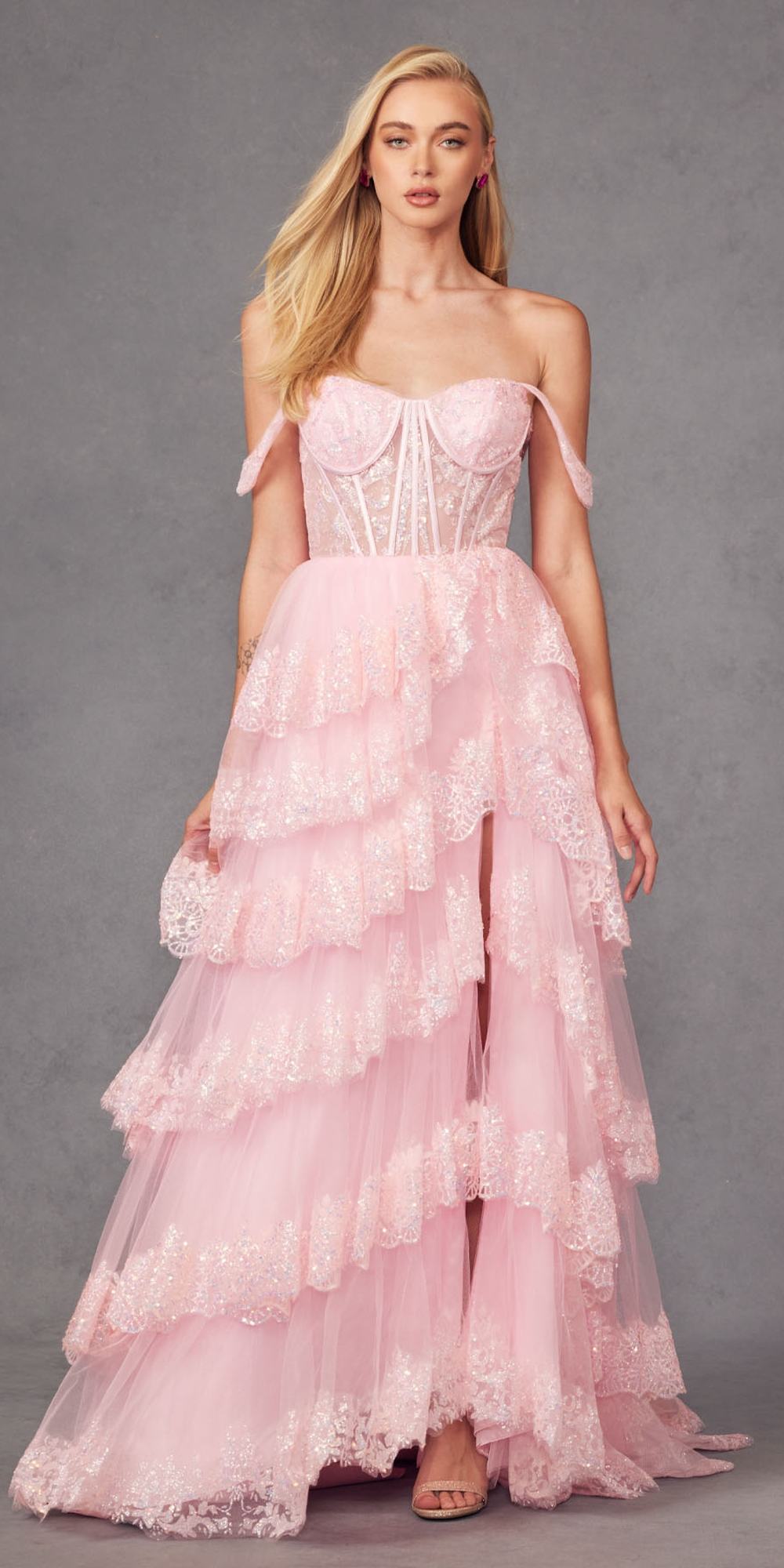 Ice pink off-shoulder A-line gown with lace corset bodice and tiered ruffle skirt