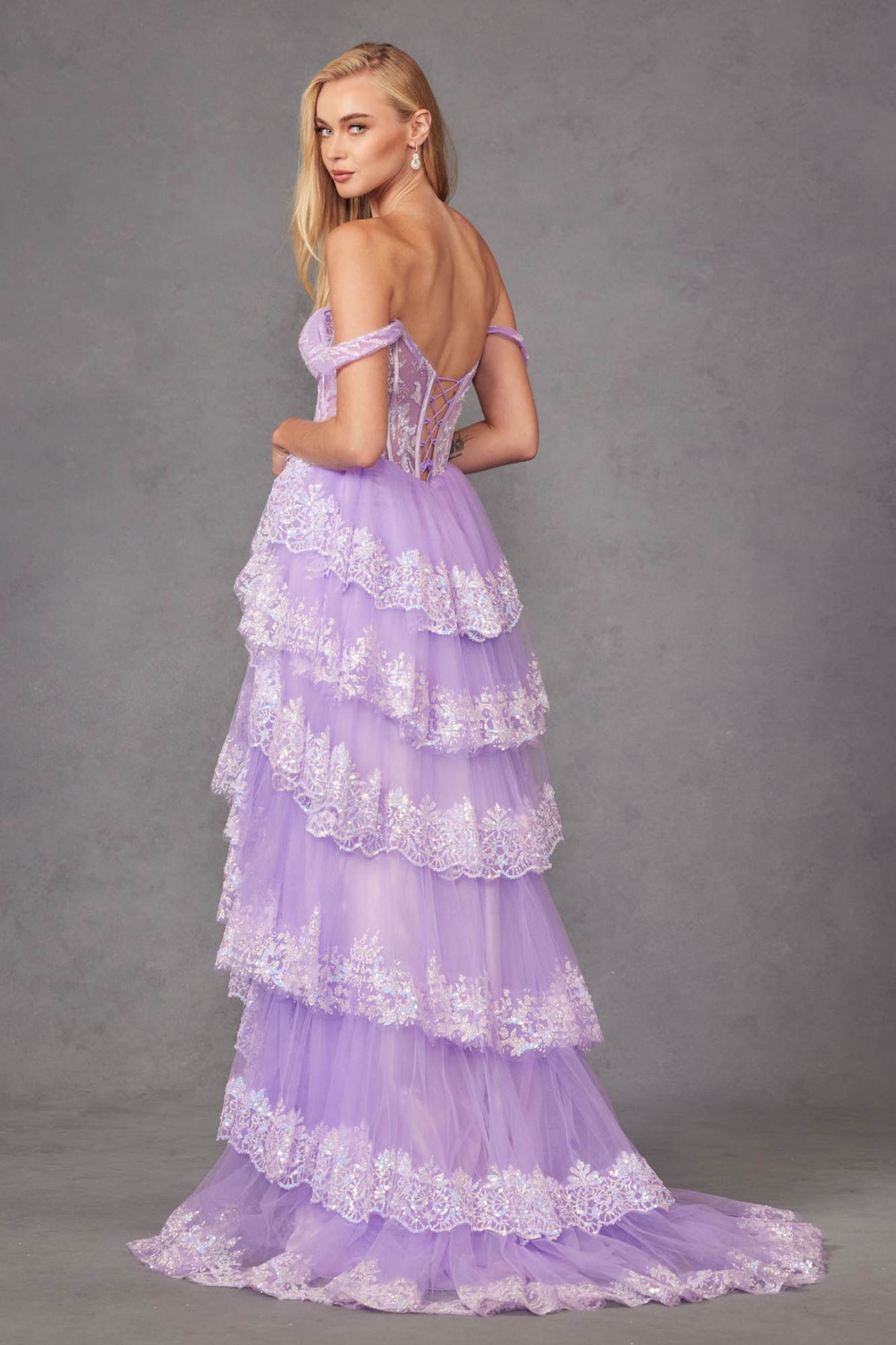 Lilac off-shoulder A-line gown with layered ruffle tiers and embellished bodice