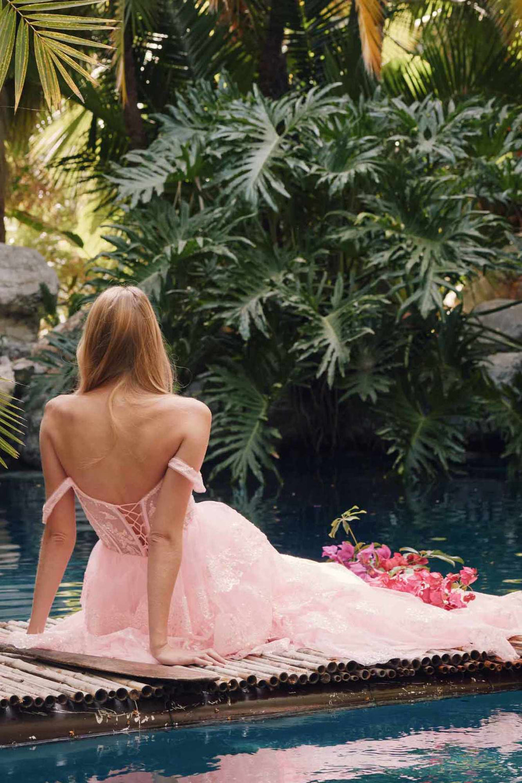 Ice pink off-shoulder gown, open back with lace corset and layered ruffle skirt