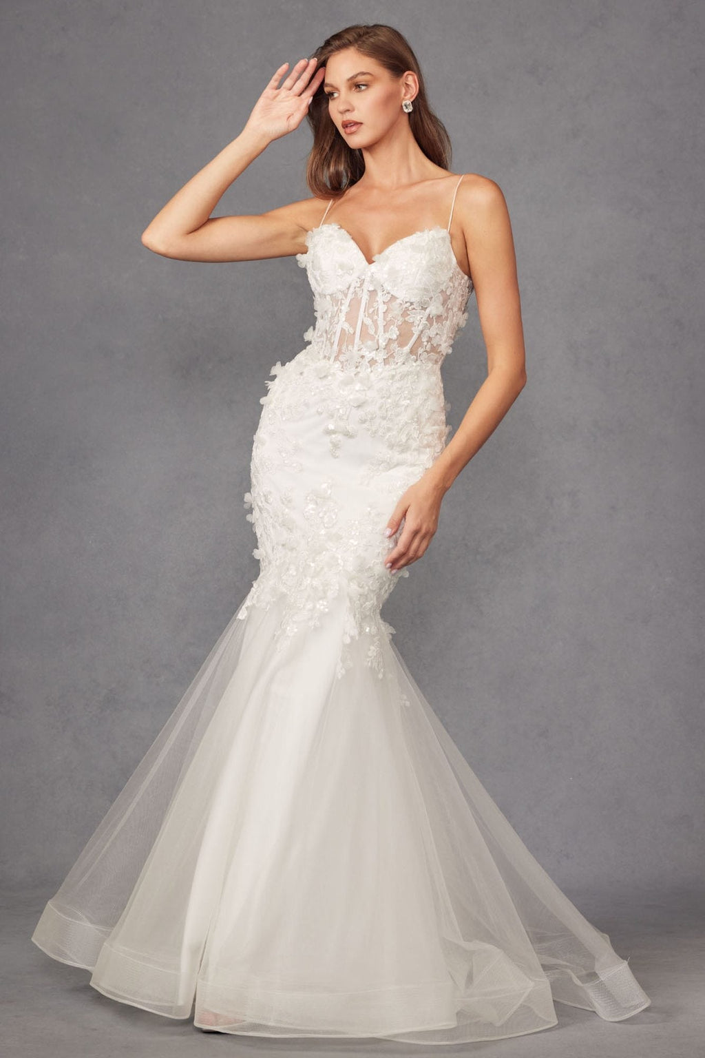 White sweetheart lace trumpet gown with thin straps and sheer tulle flare at the hem