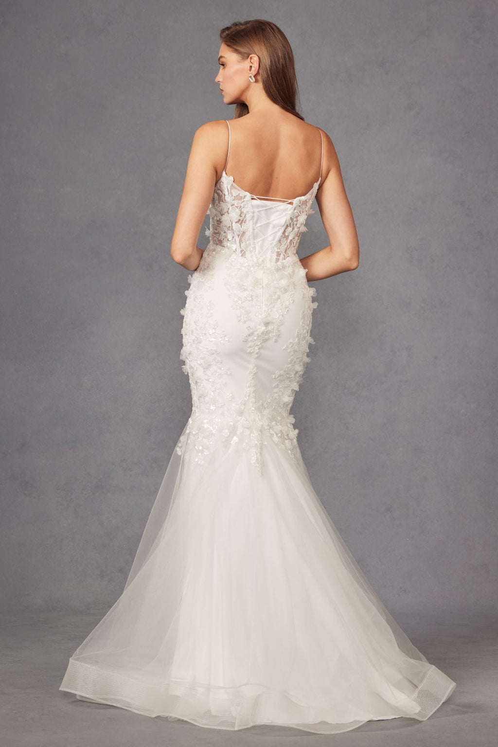 White back view of sweetheart lace trumpet gown with spaghetti straps and flared skirt