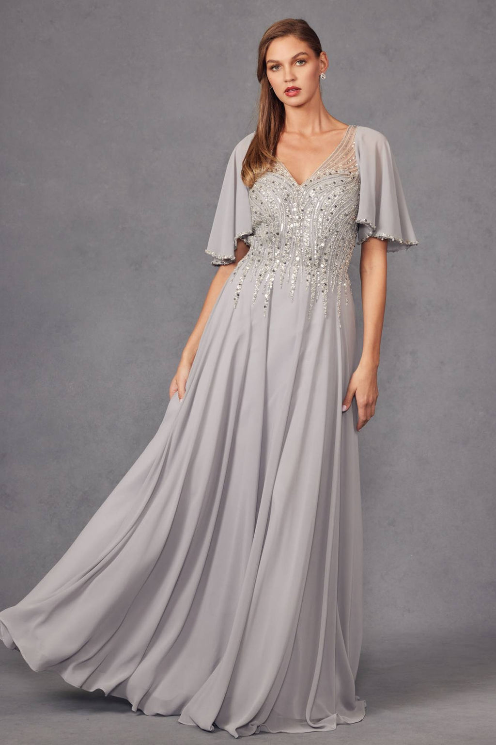 Silver long A-line evening gown with V-neck flutter sleeves and beaded sequin bodice