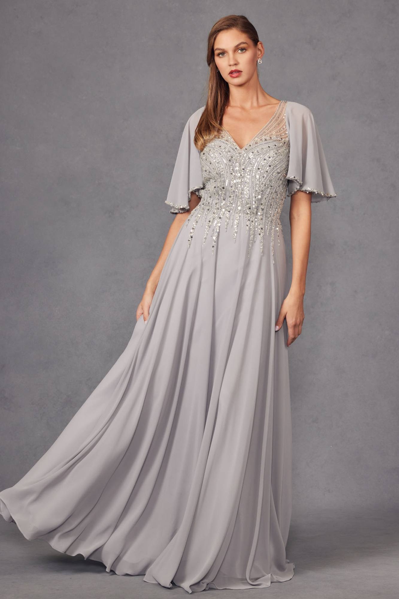 Silver long A-line evening gown with V-neck flutter sleeves and beaded sequin bodice