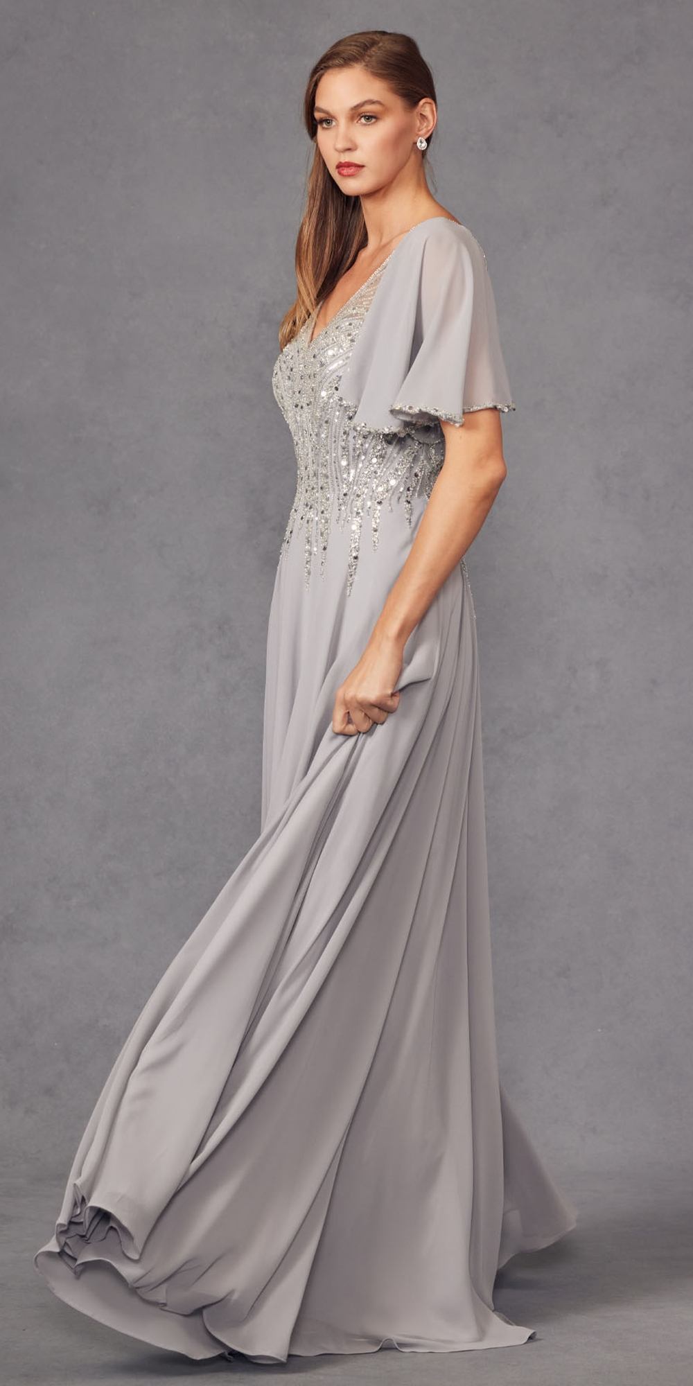 Silver long A-line evening gown with V-neck and draped flutter sleeves, beaded bodice