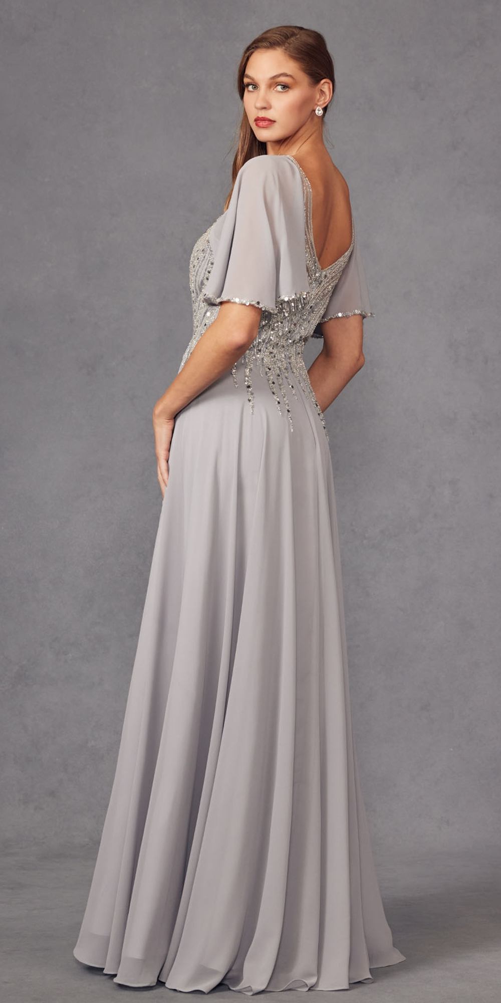 Silver long A-line evening gown with V-neck flutter sleeves and beaded sparkle bodice