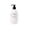 JURLIQUE calming body lotion bottle with lavender pump, white bottle