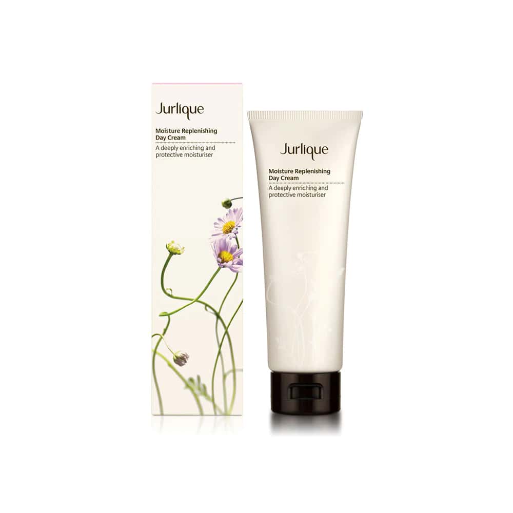 Moisture replenishing day cream in white tube with dark cap