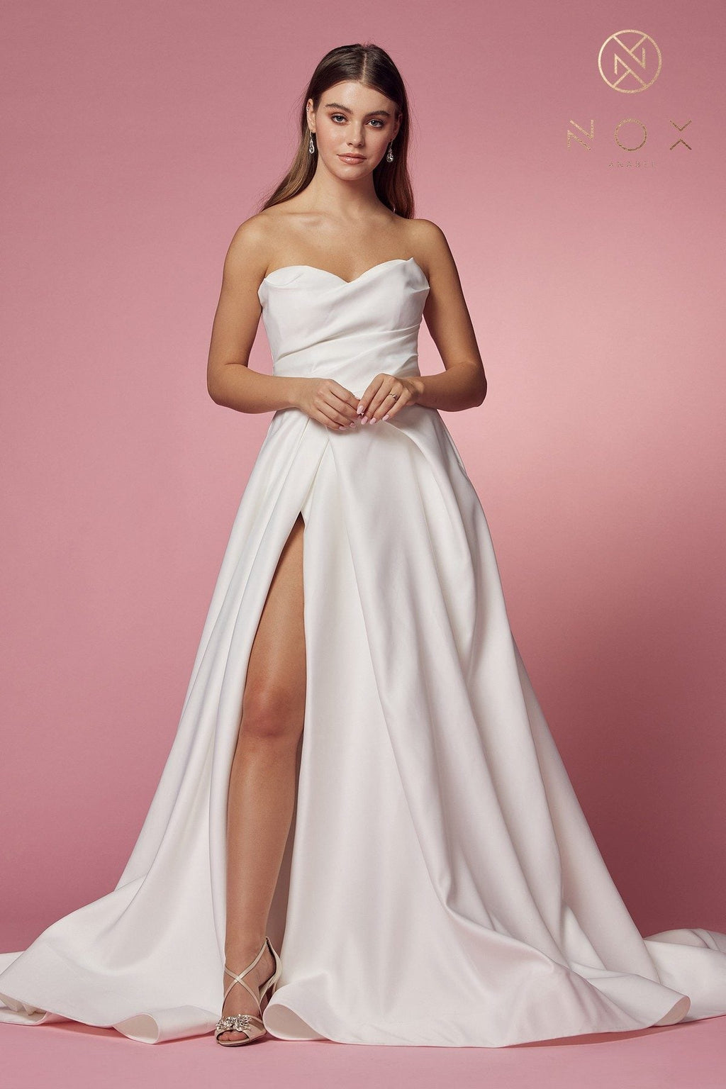 White strapless A-line gown with sweetheart neckline and high slit, full skirt