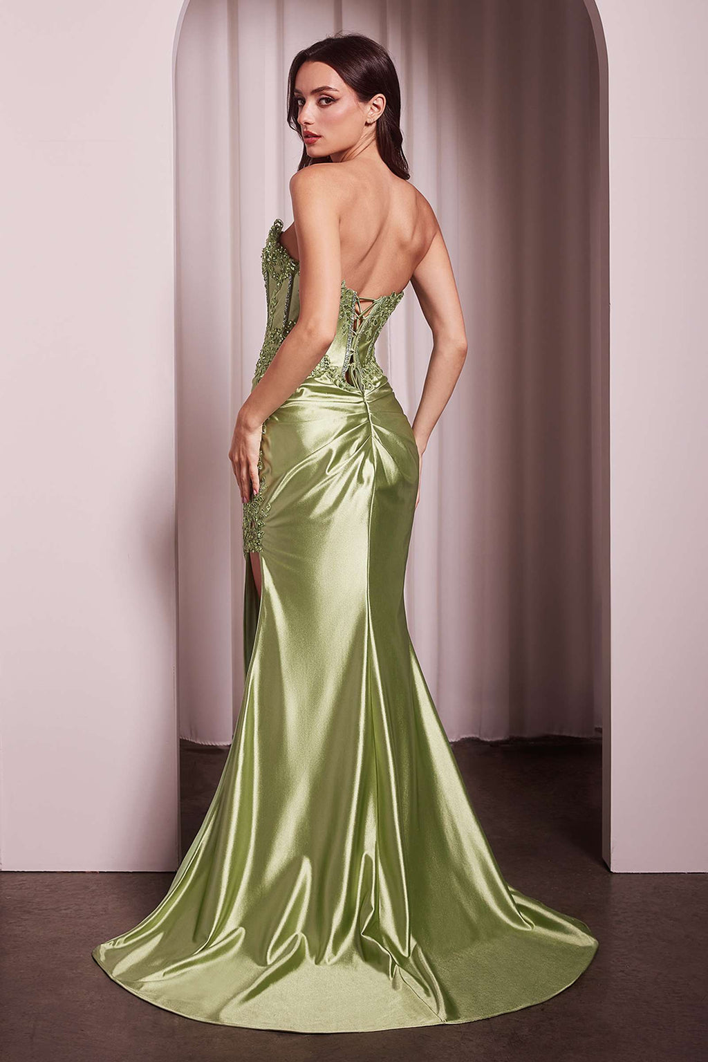 Light green strapless lace bodice satin gown with corset back and front thigh slit.